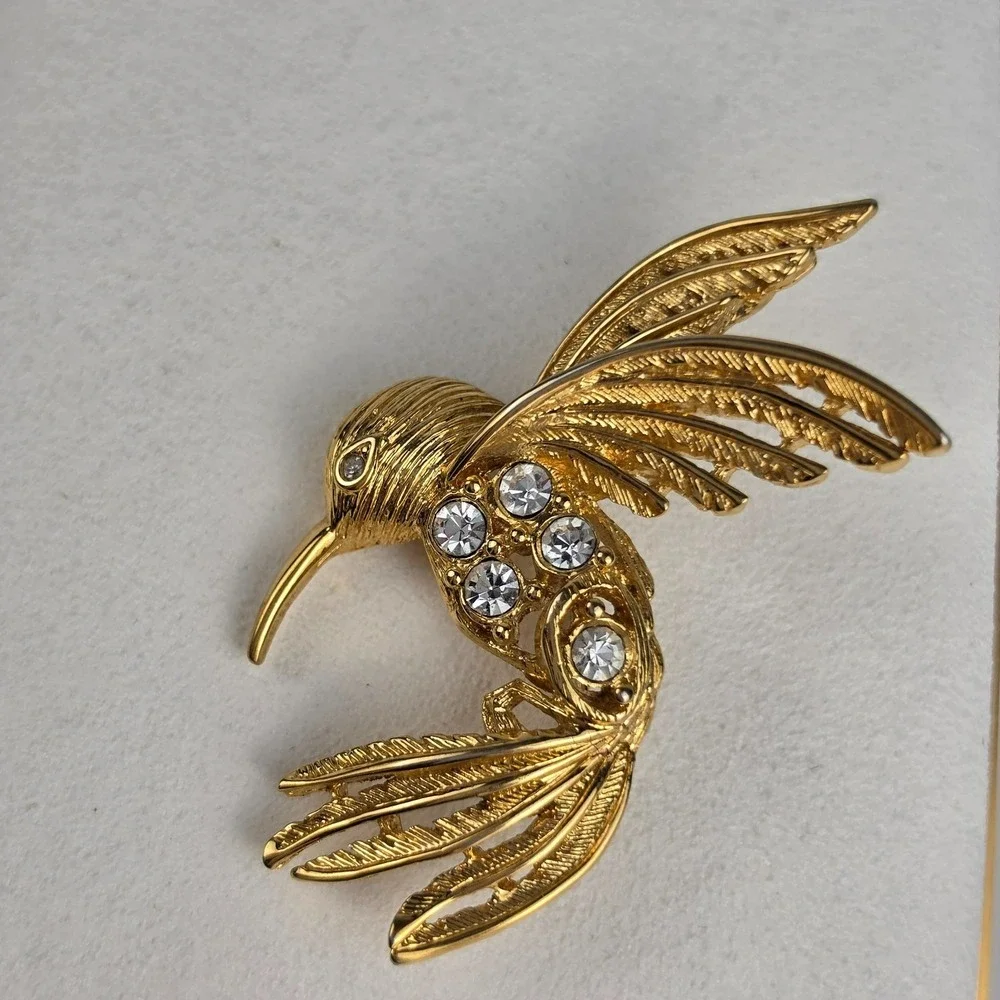 Napier Gold Tone Rhinestone Hummingbird Brooch
